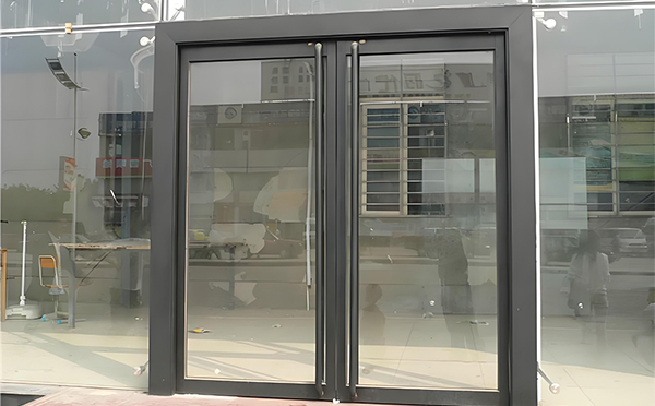 策勒玻璃地弹门